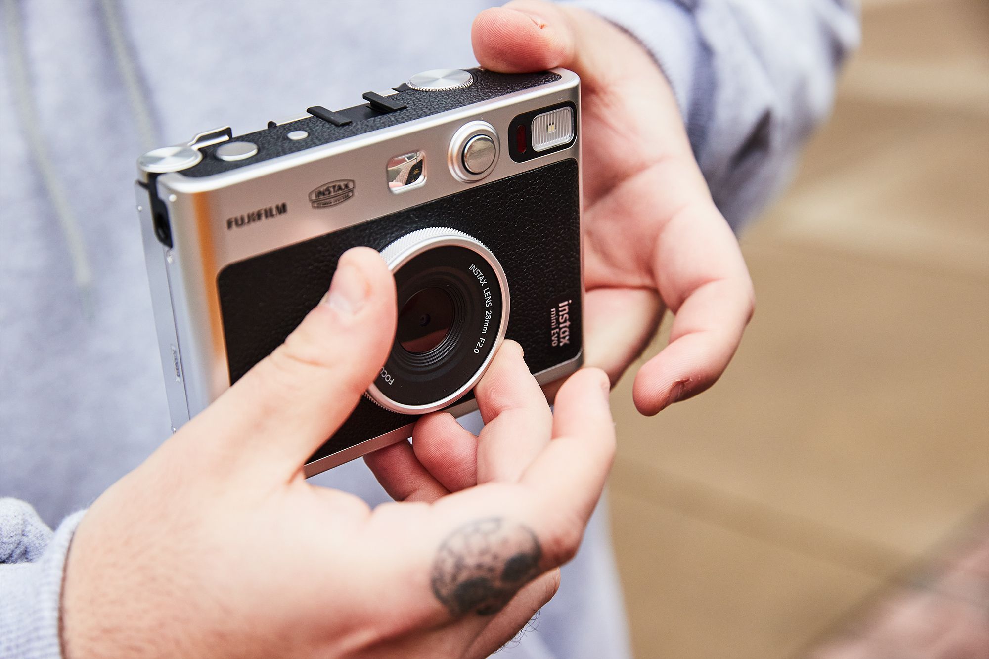 Hands-on: The Fuji Instax Mini Evo instant camera is as fun as it is  impractical