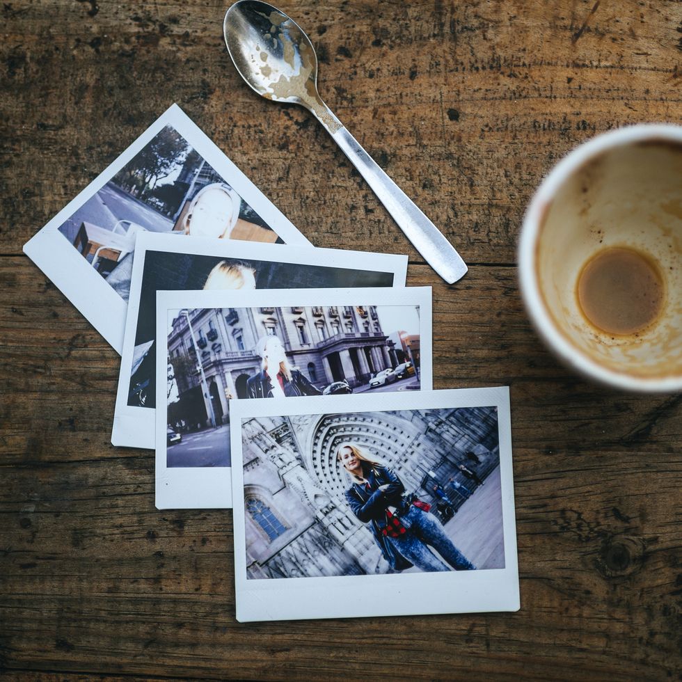 instant photos of woman on cafeteria table