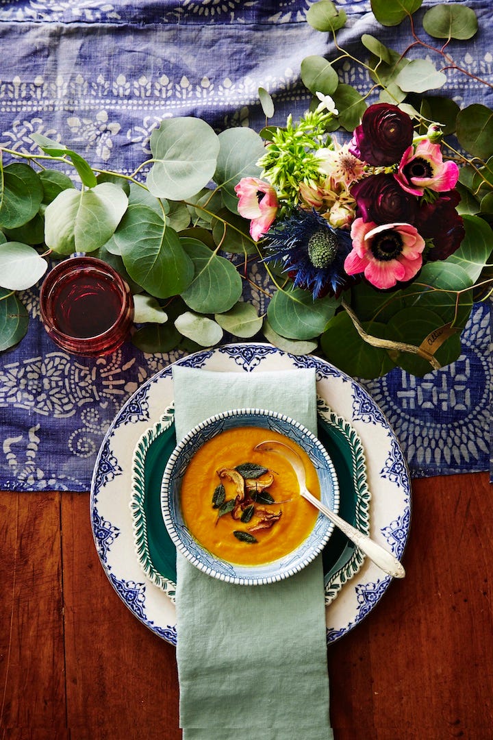squash soup in a decorative blue bowl