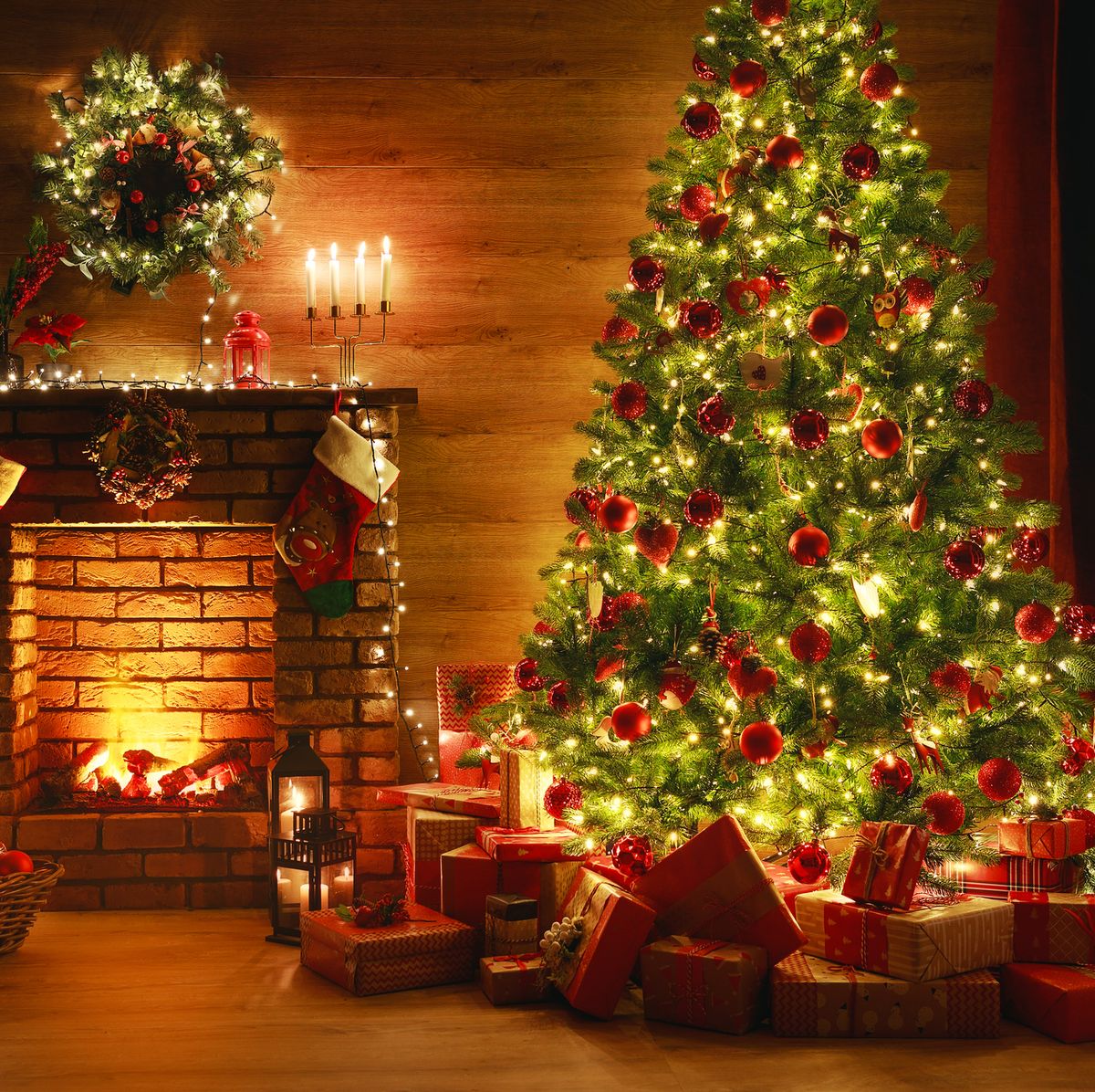 https://hips.hearstapps.com/hmg-prod/images/interior-christmas-magic-glowing-tree-fireplace-royalty-free-image-1628537941.jpg?crop=0.614xw:1.00xh;0.337xw,0&resize=1200:*