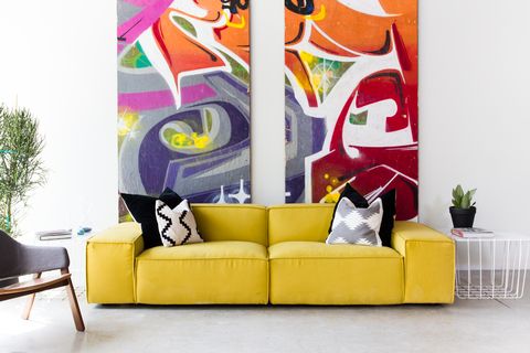 Modern art, Living room, Couch, Furniture, Sofa bed, Yellow, Interior design, Wall, Room, Purple, 