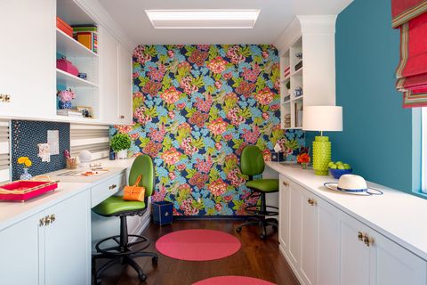 craft room with floral wallpaper