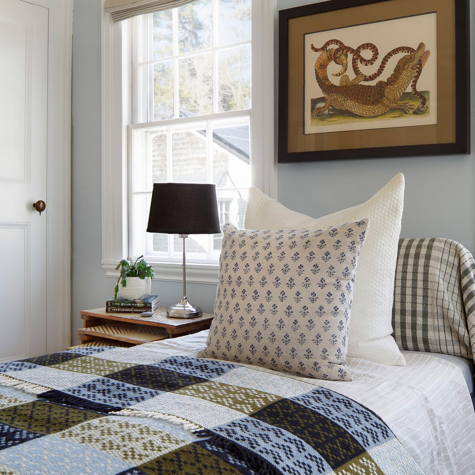 bedroom with plaid bedspread