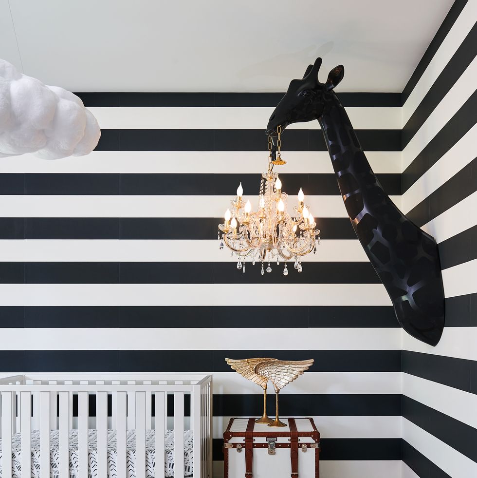 nursery with black and white striped walls