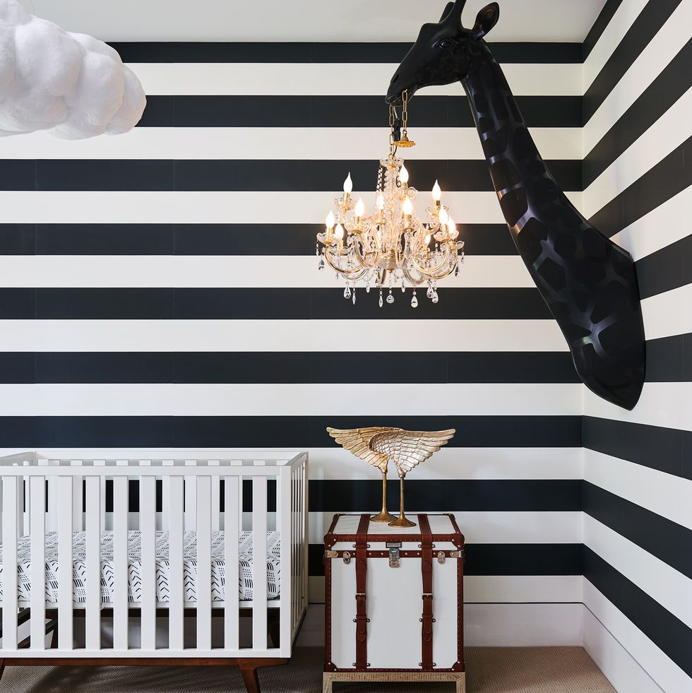nursery with black and white striped walls