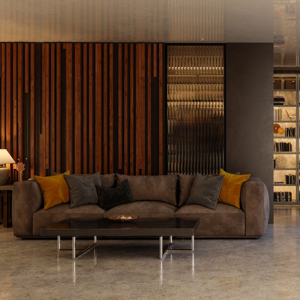 interior of luxurious living room with sofa and bookshelf dusk scenery from the window