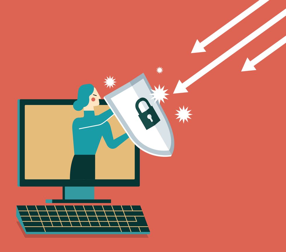 illustration of a woman coming out of a computer screen holding a shield to stop incoming misiles