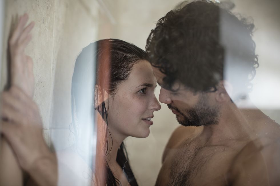 intimate young couple in shower