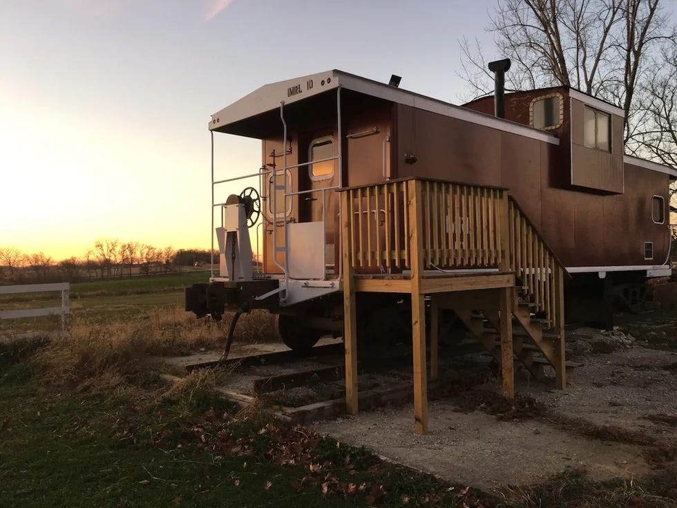 a wooden house on a trailer