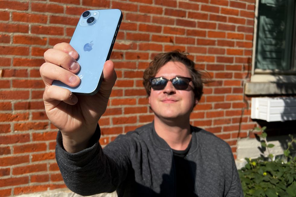 brandon taking selfie with iphone 14