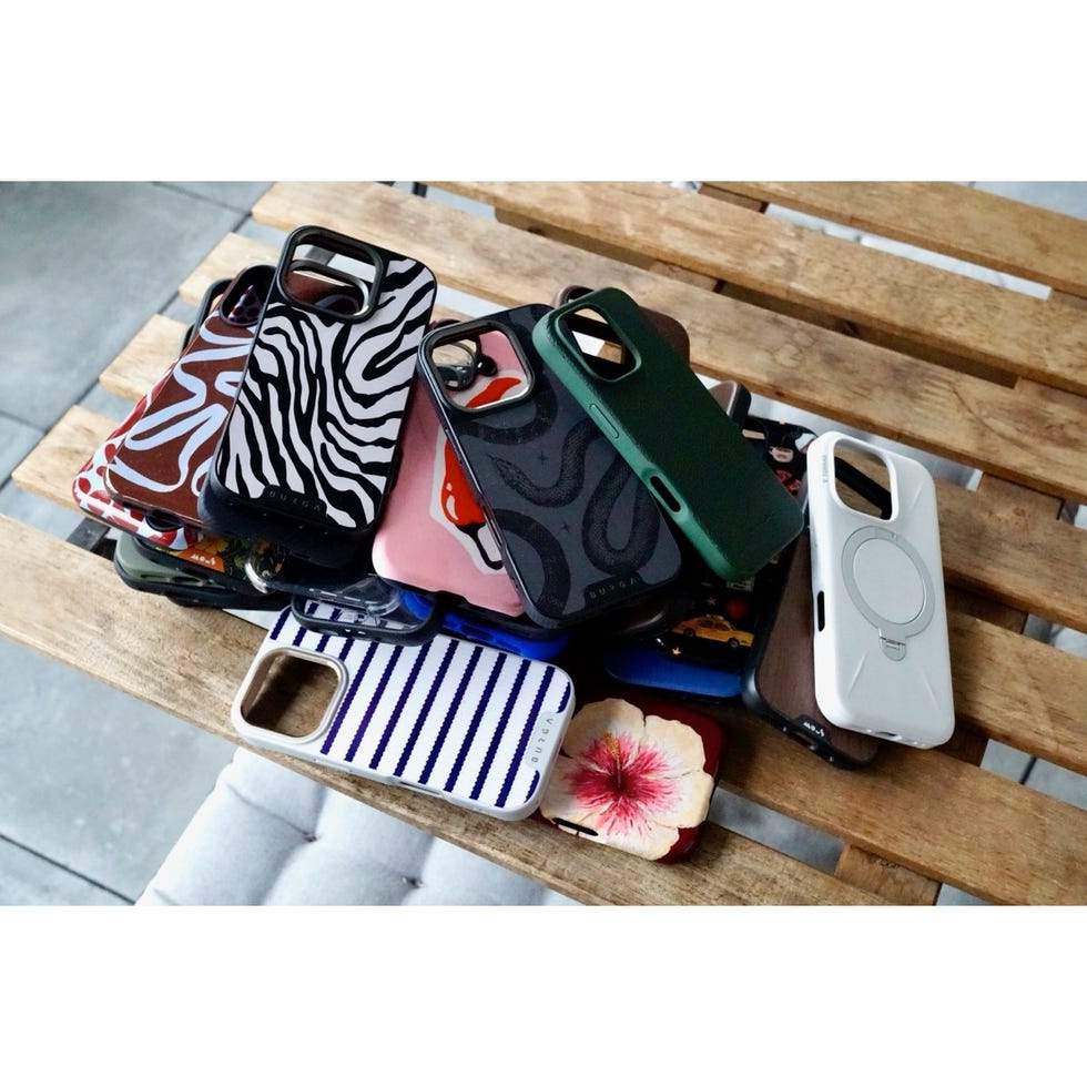 variety of iphone 16 cases arranged on a wooden surface