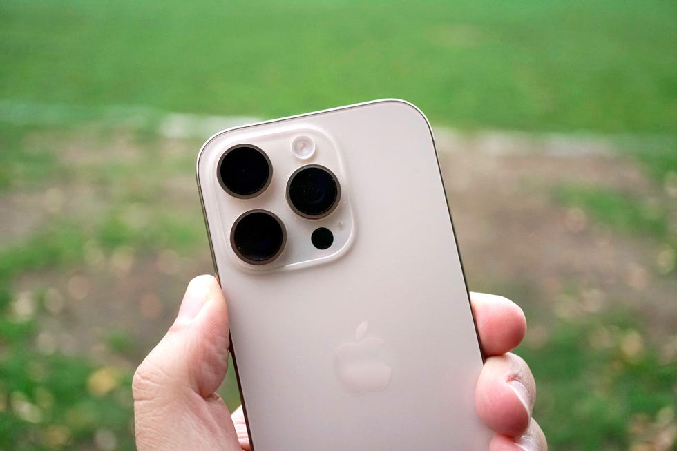 smartphone featuring multiple rear cameras held in a hand