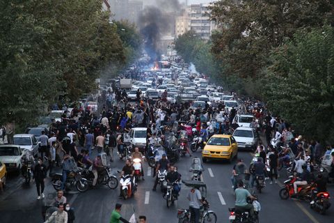 topshot   a picture obtained by afp outside iran on september 21, 2022, shows iranian demonstrators taking to the streets of the capital tehran during a protest for mahsa amini, days after she died in police custody   protests spread to 15 cities across iran overnight over the death of the young woman mahsa amini after her arrest by the countrys morality police, state media reported todayin the fifth night of street rallies, police used tear gas and made arrests to disperse crowds of up to 1,000 people, the official irna news agency said photo by afp photo by  afp via getty images
