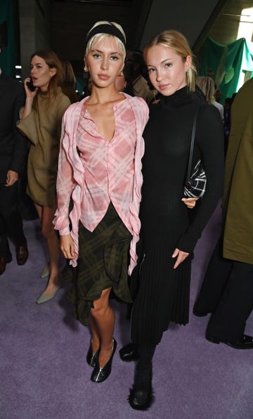 iris law and lila moss attend the burberry summer 2025 show during london fashion week