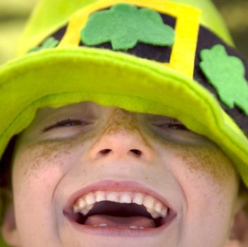 irish child st patrick's day smiling leprechaun clover hat boy