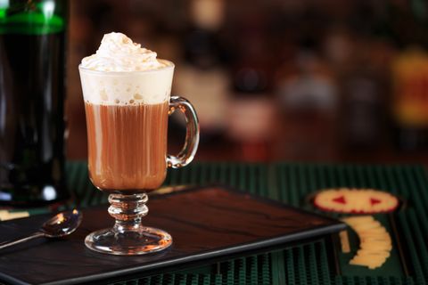 irish coffee in a bar concept of st patrick holiday holiday background