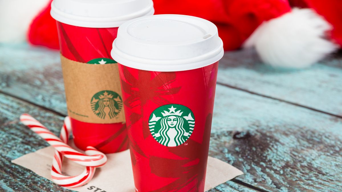 preview for Here's A Look Back At 21 Years Of Starbucks Holiday Cups