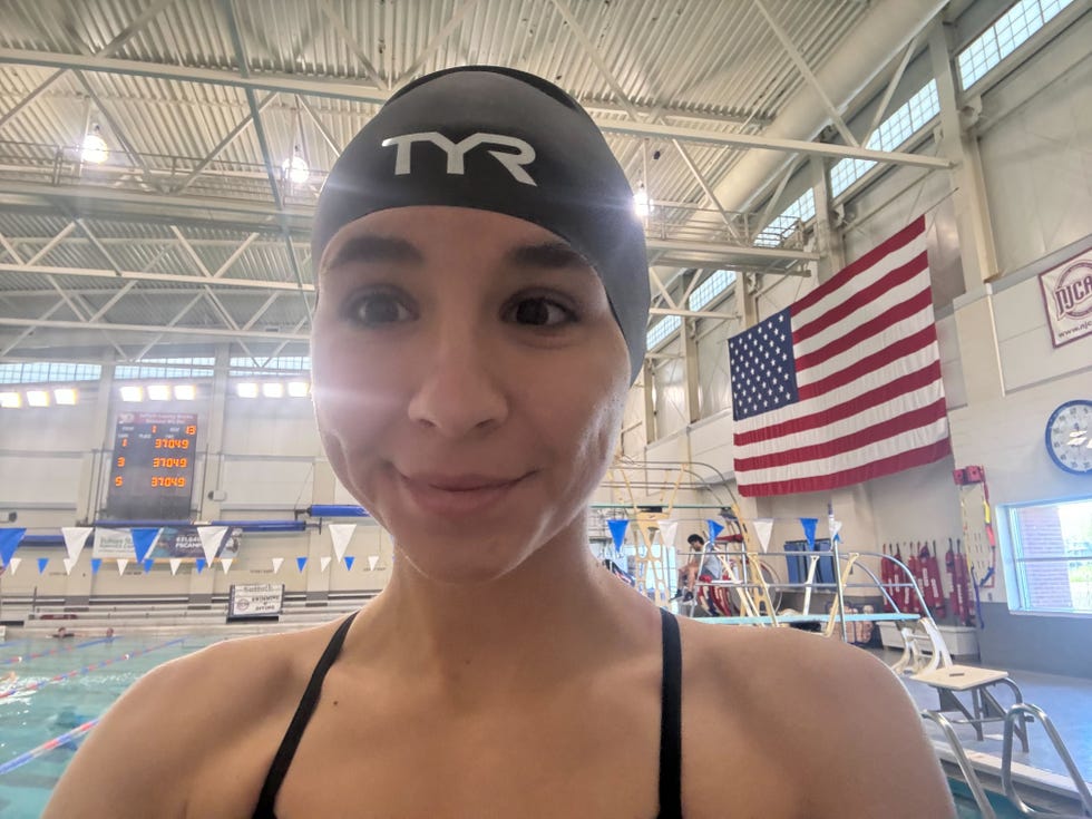 isabella wearing the tyr swim cap for long hair