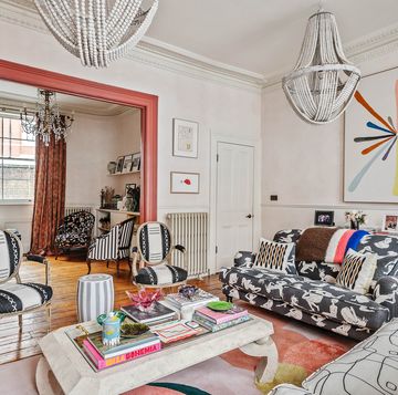 colourful living room with sofas, chairs and a coffee table