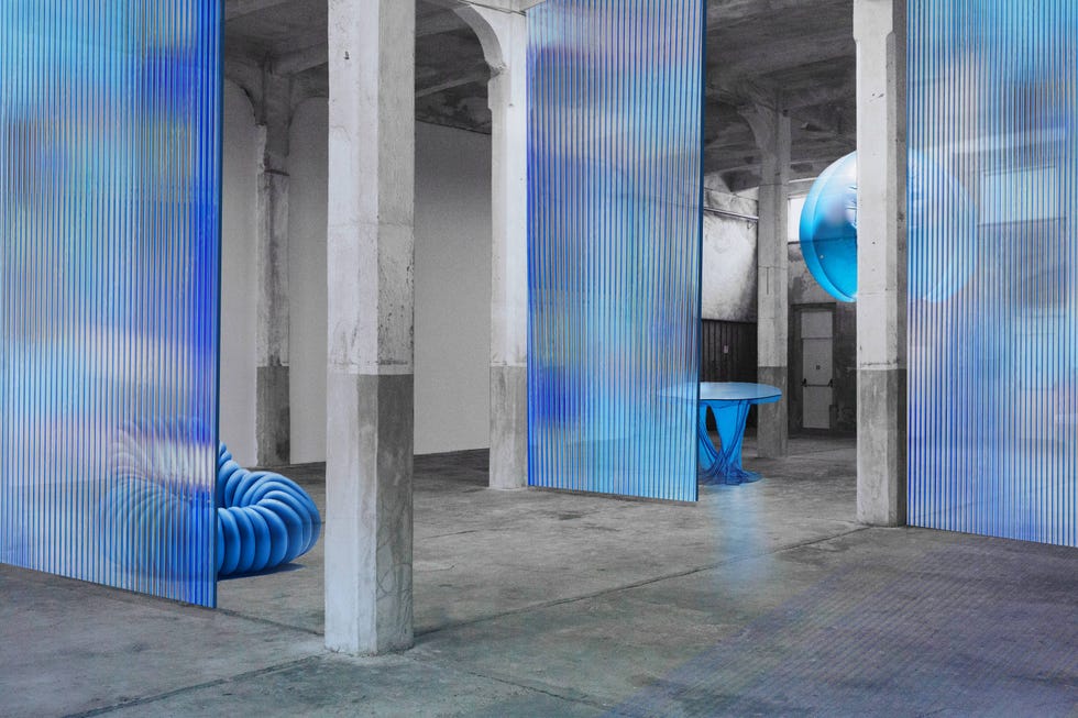 a blue chair in a room