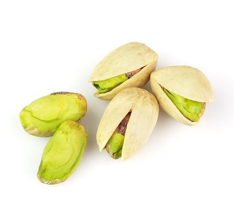 Isolated image of dried pistachio nuts