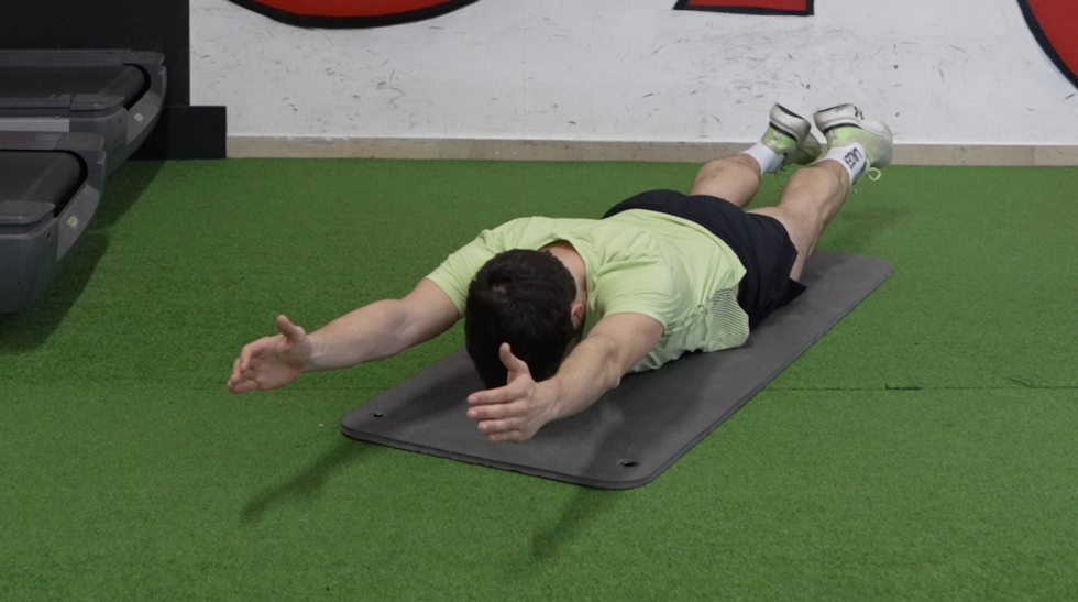 superman hold, core, running coach, isometri, coach cip, coach del mese, running