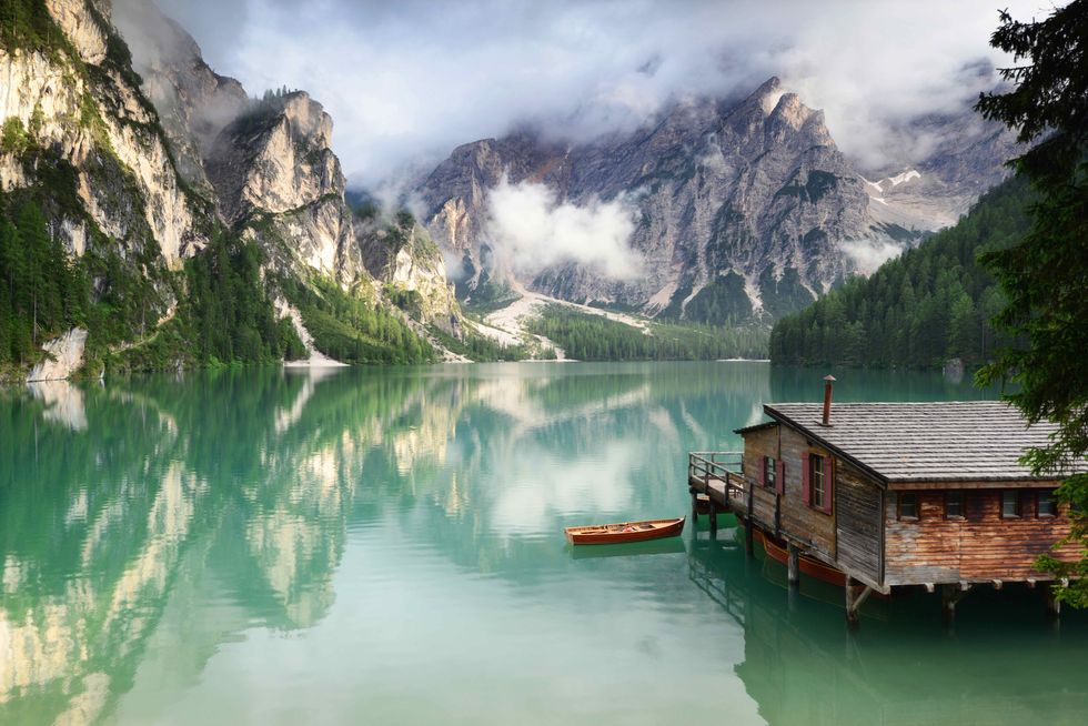 Lonely boat in Lago di Braies, Dolomites