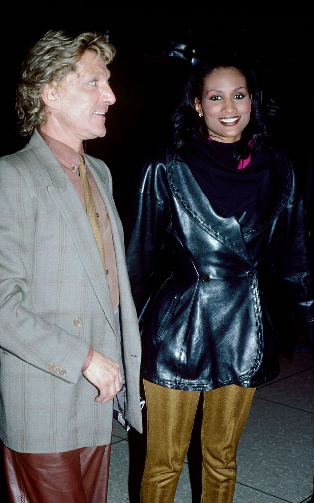 two people outside studio 54 to illustrate a roundup of 80s fashion