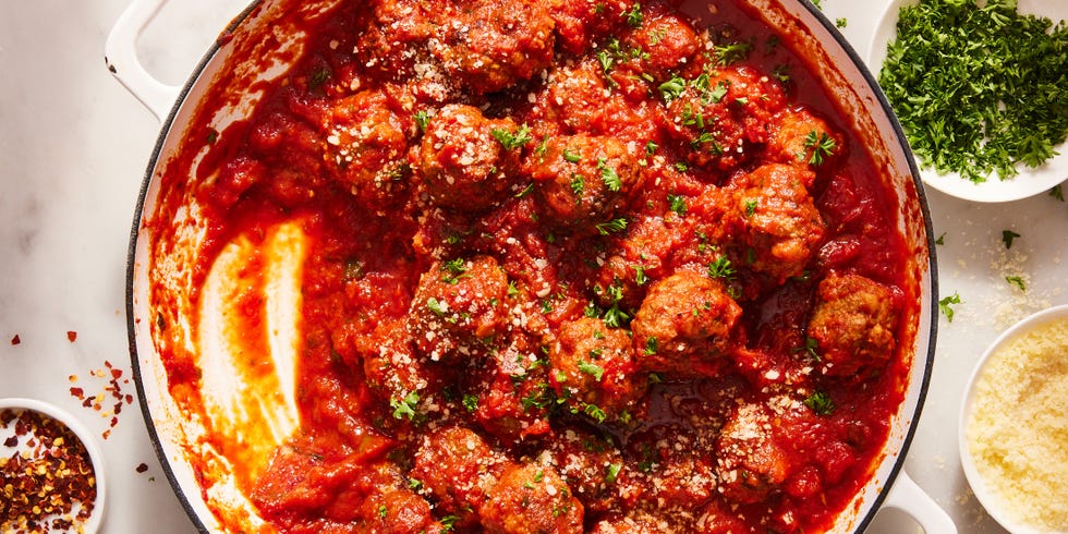 homemade italian meatballs in marinara with herbs