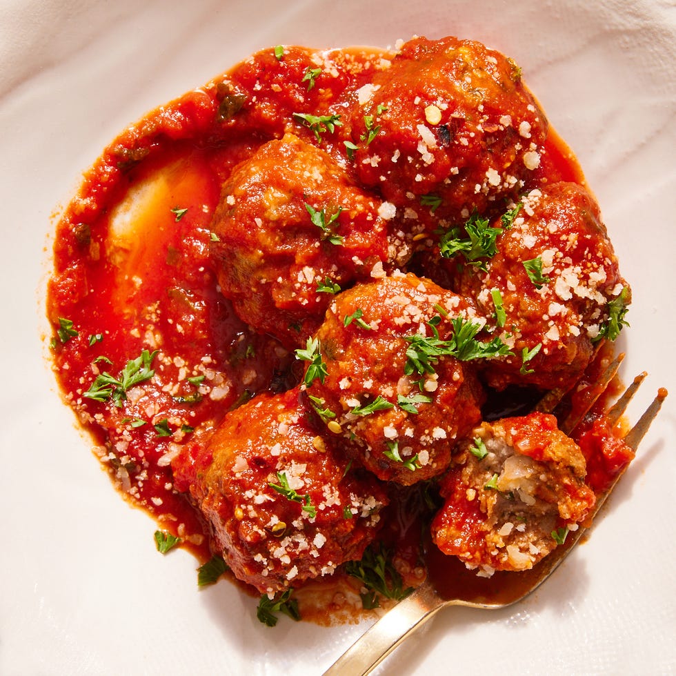 homemade italian meatballs in marinara with herbs