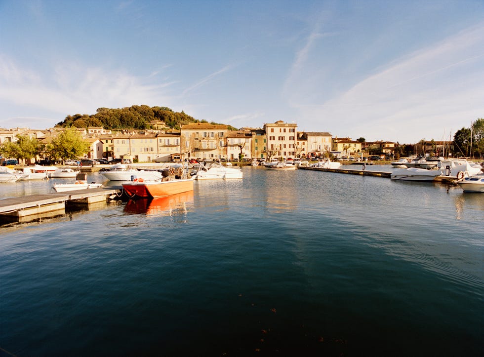 italian town harbour by a lake