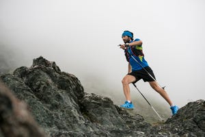 italy, alagna, trail runner on the move near monte rosa mountain massif