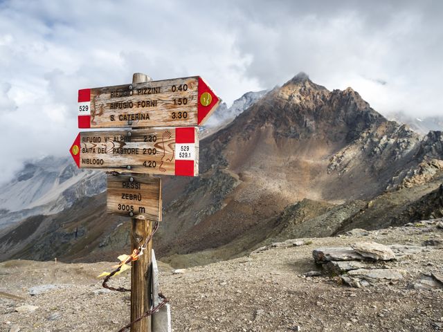 italy, ortler alps, sign post, gran zebru in the background