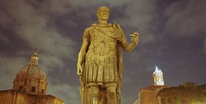 italy, rome, statue of caesar in front of roman forum