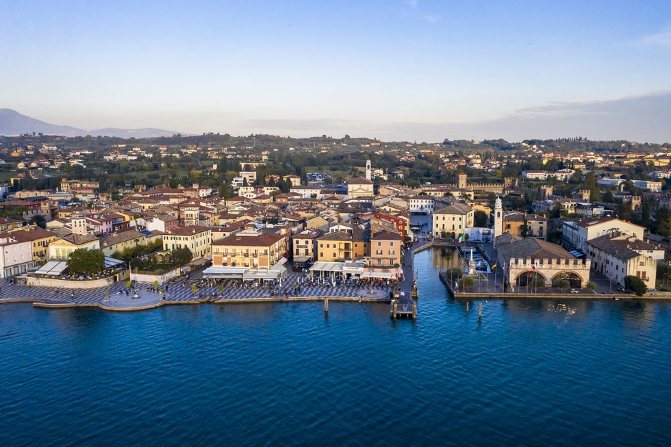 italy, veneto, lazise, aerial view of town on eastern shore of lake garda