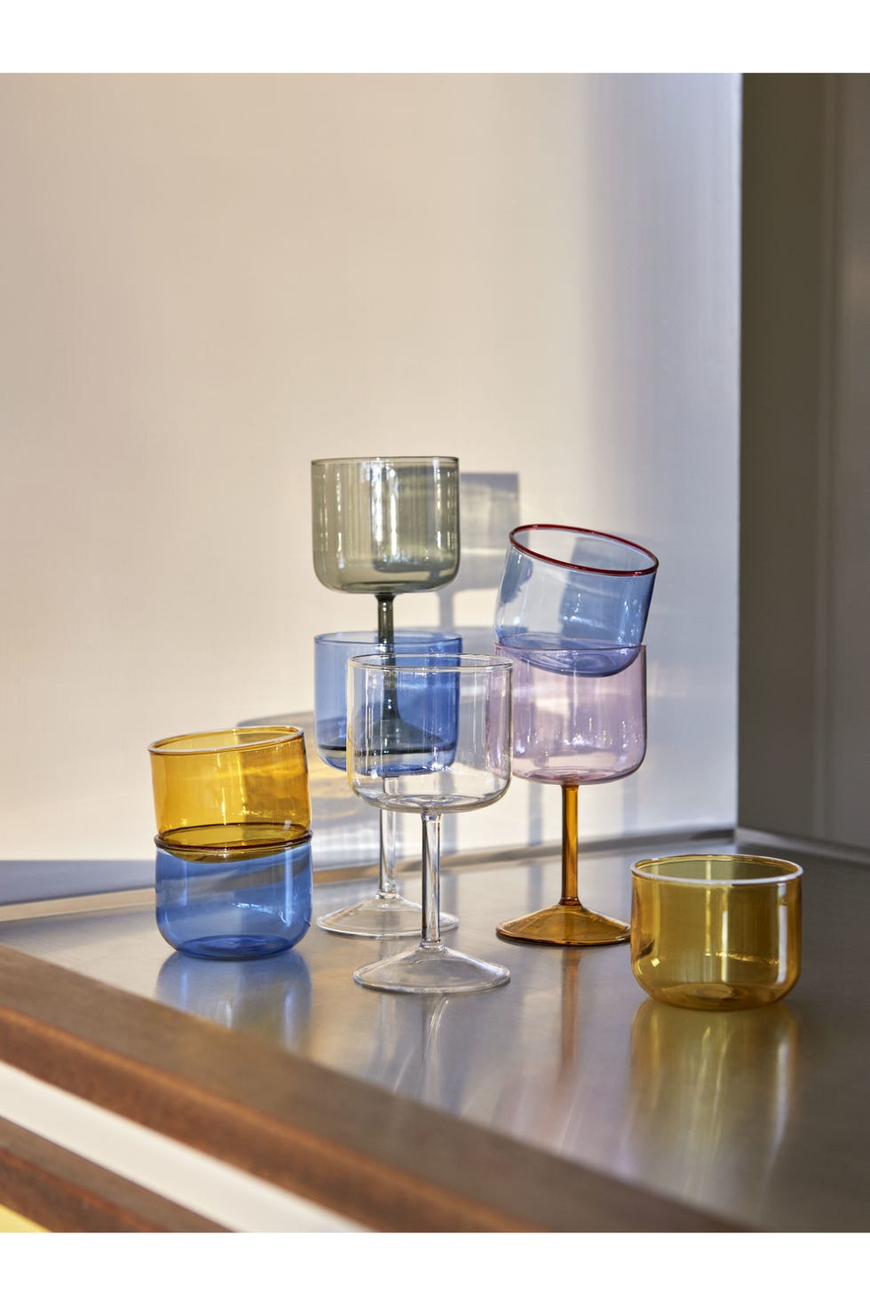 a group of glasses with liquid in them