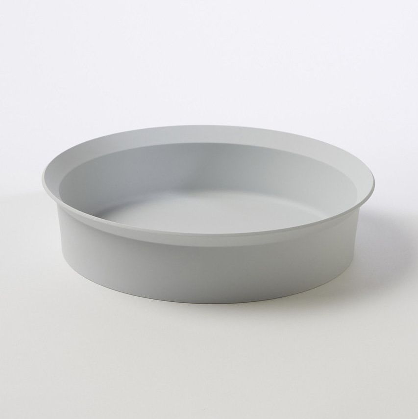 a white plate on a white surface