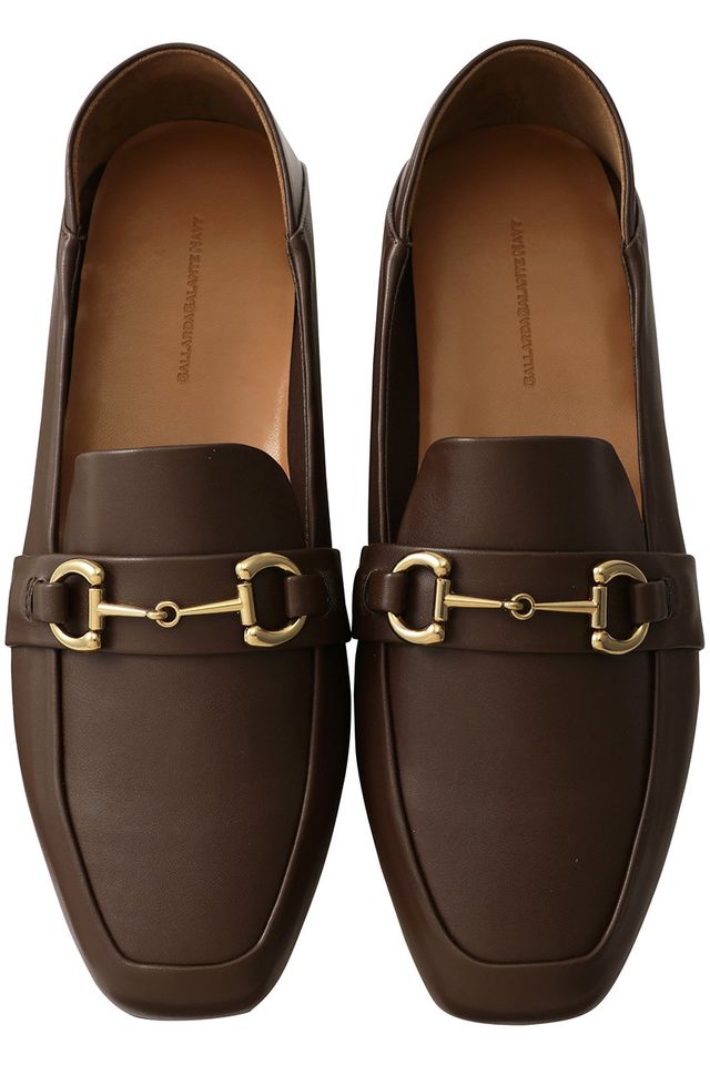 a pair of brown leather shoes