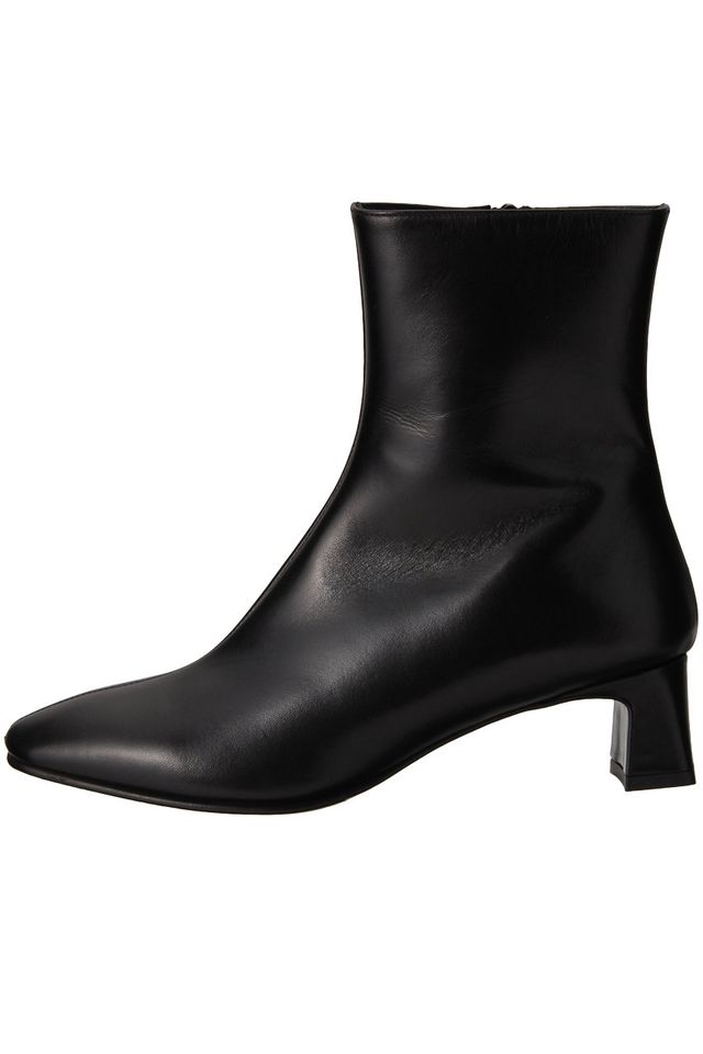 a black boot with a white background