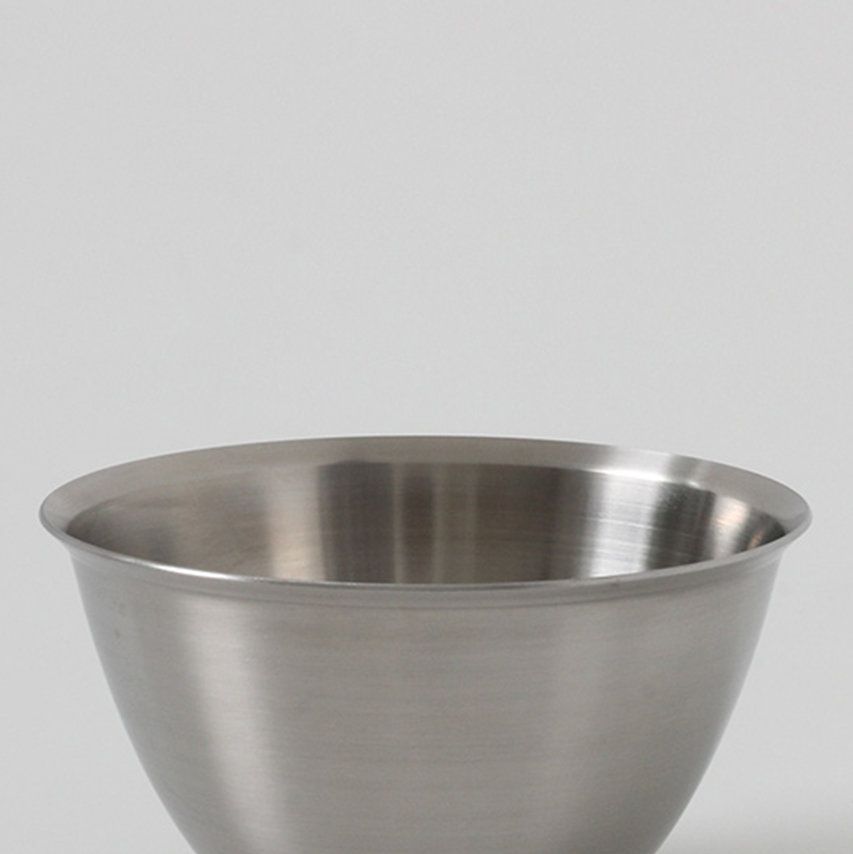 a bowl on a white surface