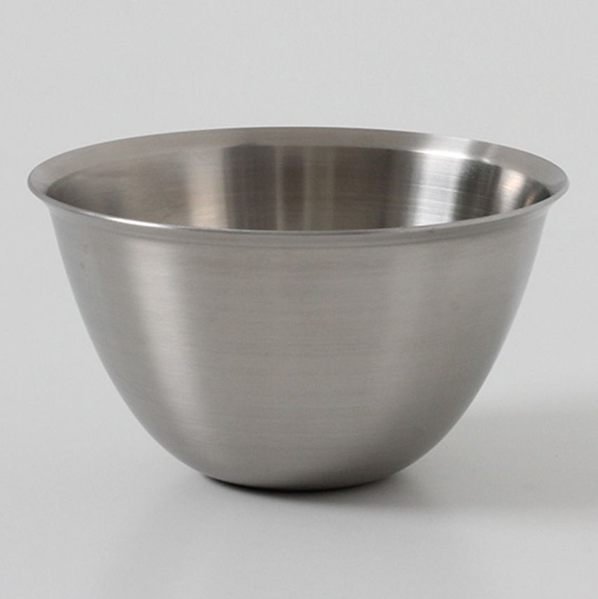 a bowl on a white surface