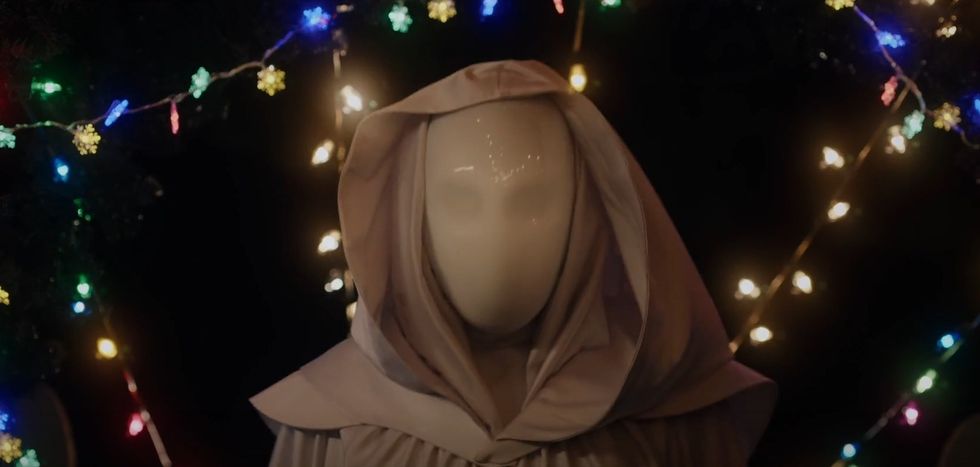 a person wearing a hood