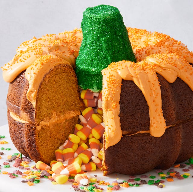 It's The Great Bundt-kin, Charlie Brown two pumpkin bundt cakes stacked on each other, filled with candy corn, and decorated to look like a pumpkin