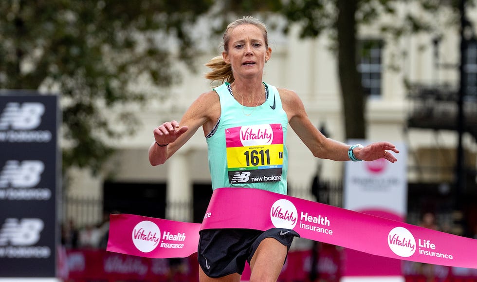 a participant crosses the finish line at the vitality london 10,000, sunday 24th september 2023 photo ian walton for london marathon events for further information medialondonmarathoneventscouk