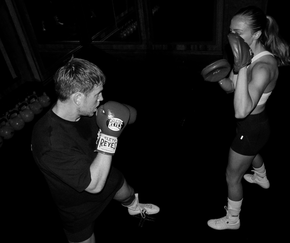 a man and woman boxing