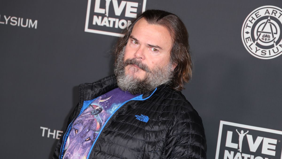 Jack Black lets his bushy beard go to its natural color as he walks round  LA in funky garish shorts