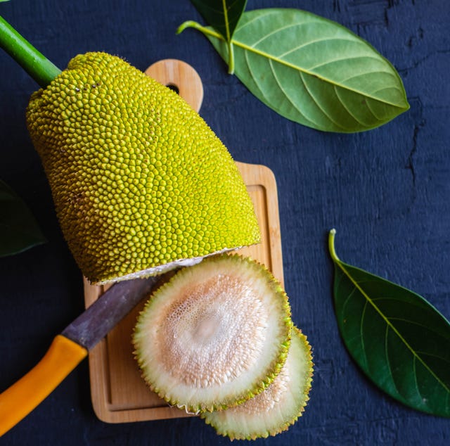 jackfruit sliced fruit on black background