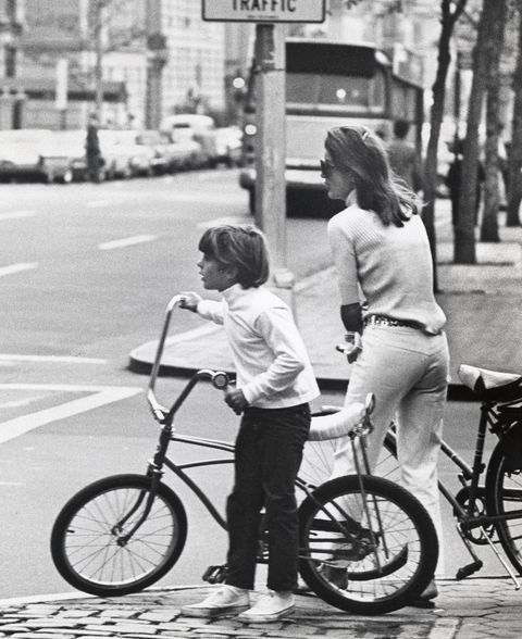 John Kennedy and Jackie Kennedy riding their bikes through Central Park