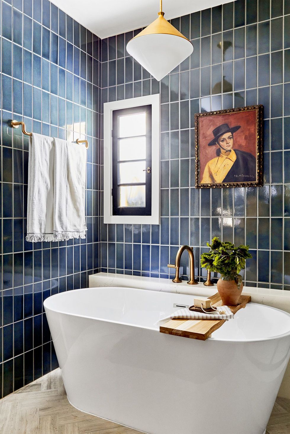 bathroom, bathtub, blue tile home of jaclyn johnson of create  cultivate interior designer ginny macdonald ginnymacdonald1666202035psd