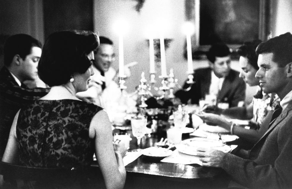 jacqueline and robert kennedy at a dinner party hosted by the kennedys in georgetown 1957